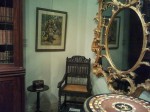 Rare 17th century Ceylon/South India ebony armchair,  from Longleat, with ebony tripod table and Ernst Agerbeek pastel of Dayak girl