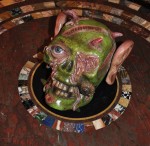 Jake and Dinos Chapman bronze painted skull on Regency pietra dura table