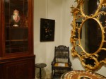 Eichlemann collage, Charlotte Hodes pot in Regency bookcase with pietra dura table, Rococo looking-glass and ebony chair and table