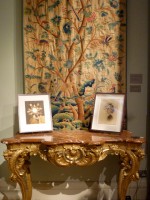 Julie Cockburn images on carved German side table in front of Crewelwork panel